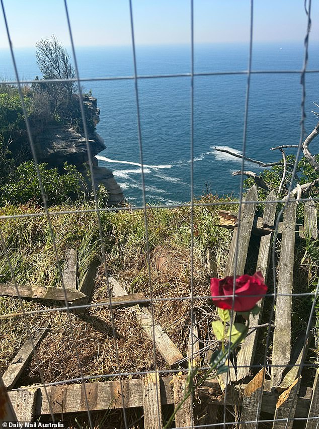 A mourner left a rose at the scene of the crash on Thursday