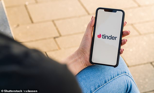 Australians have already lost almost $24 million to romance scams this year, with 74 percent of that money lost to women.  The photo shows a woman looking at the Tinder app on her phone