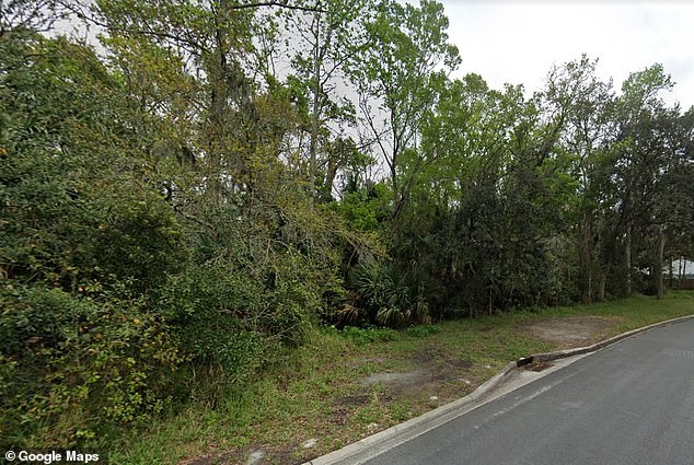 Jared was shot on this road, surrounded by trees, in Jacksonville Beach.  No cameras captured the murder - which took place after the late director left his vehicle to remove a tire placed in the middle of the road