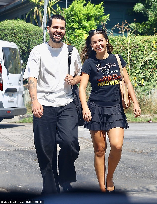 Grinning girl: Addison couldn't stop smiling as she stood side by side with her boyfriend of two years