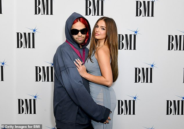 A cheeky sentiment: Addison's clingy boyfriend couldn't resist posing with a hand on her derriere at the 70th annual BMI Pop Awards;  seen in May 2022