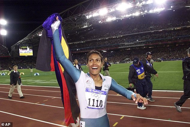 Freeman carried both the Australian and Aboriginal flags on her victory lap after winning the 400m sprint 23 years ago