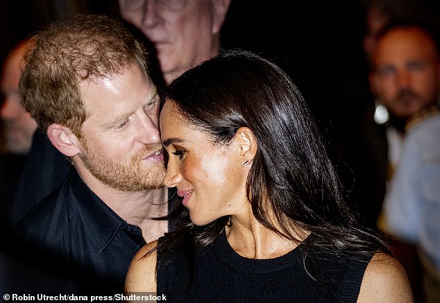 During the speech on Wednesday, Meghan apologized for being late to the games, adding that she had to take her eldest Archie, four, to school.  Pictured: The couple was reunited in Germany on Wednesday