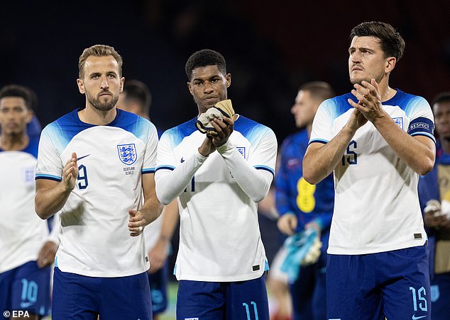 Maguire (right) showed his appreciation for the traveling England fans who supported him