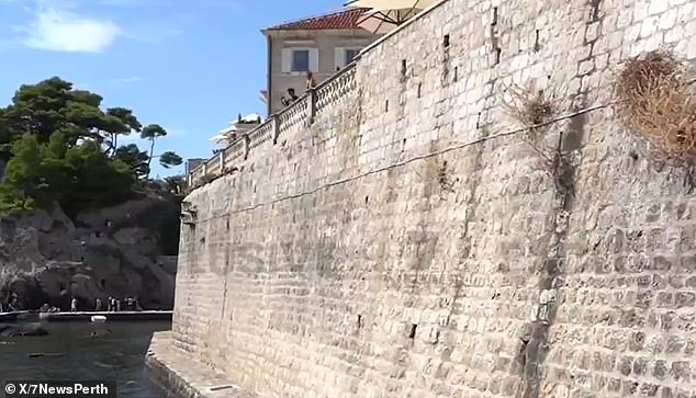 Ms Cutler had been drinking with the 34-year-old man when the two leaned against a wall (pictured) shortly before they fell over