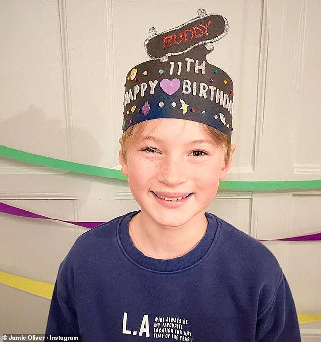 Tradition: The family's birthday tradition was also reflected in the budding chef wearing a homemade birthday crown at different ages