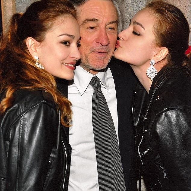 They were pictured kissing Robert DeNiro at a Vanity Fair party in 2011