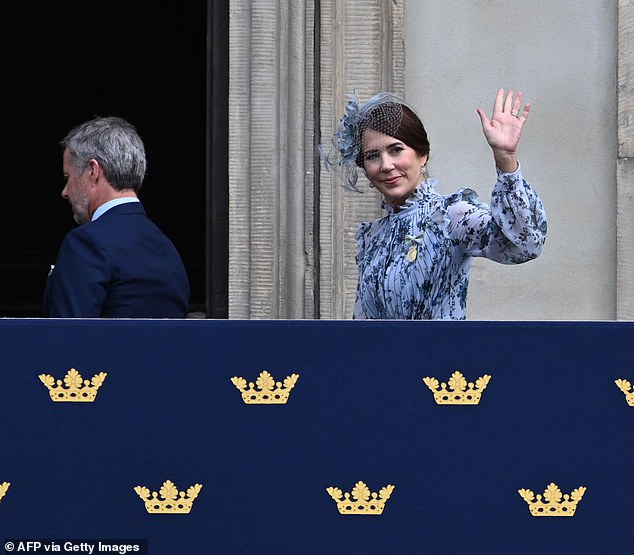 The princess, 51, looked very youthful indeed in a flowing floral dress in pastel blue tones.  It had semi-transparent sleeves and pleated skirts