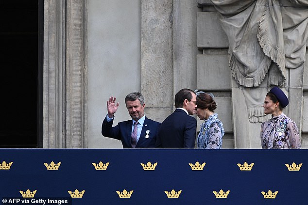 The royal family chatted happily as they watched the procession from a balcony next to 11-year-old Princess Estelle