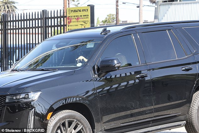 The man got behind the wheel: Joe was driving a huge black SUV