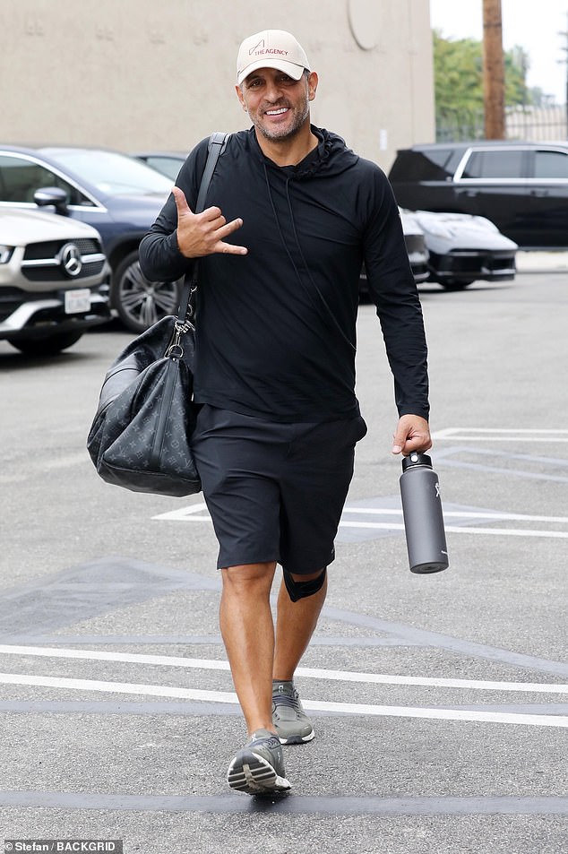 Excited expression: Around the same time, real estate mogul and Real Housewives of Beverly Hills star Mauricio Umansky, who works with professional dancer Emma Slater, arrived