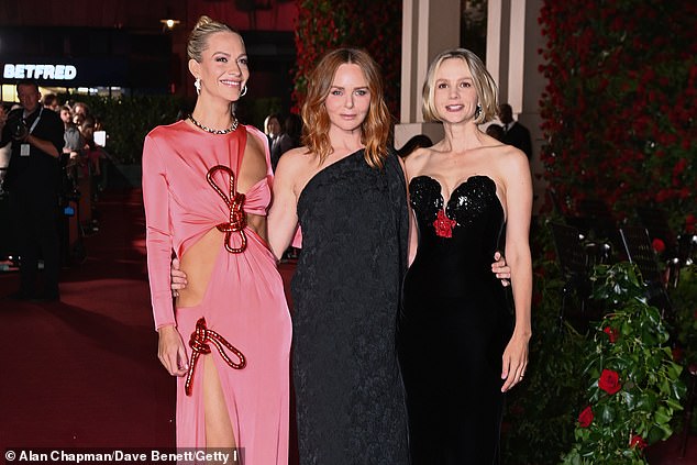 (L to R) Poppy Delevingne, Stella McCartney and Carey Mulligan visit Vogue World