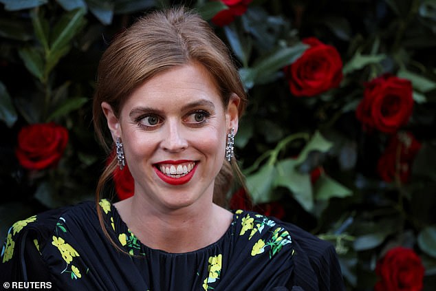 Princess Beatrice poses for a photo while visiting Vogue World