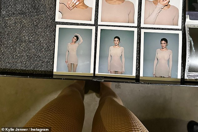 Earth tones: She also shared some Polaroid photos of her modeling the sand-colored dress and tights