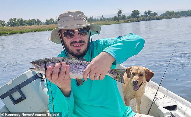 Mike is an avid fisherman who retreats to the Bighorn River as it is known for its great trout fishing (photo: Mike with another trout he caught that day