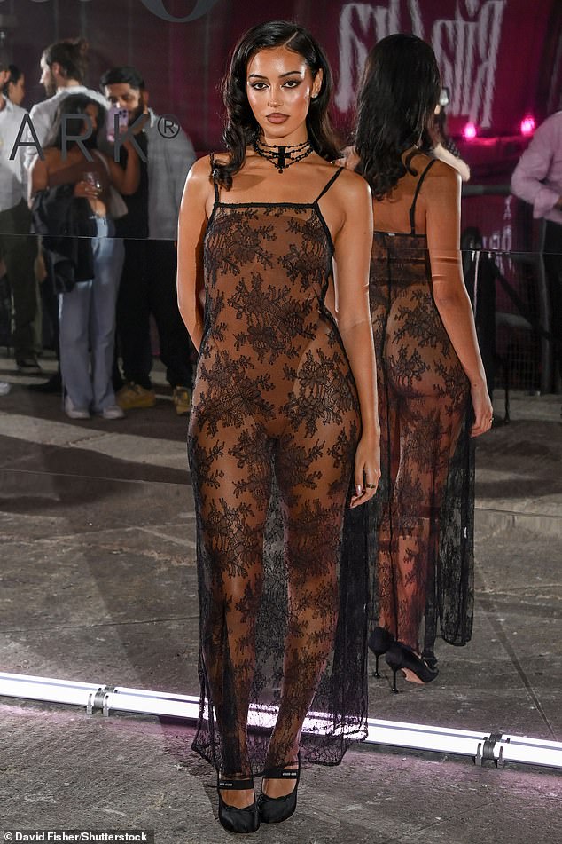 Sensational: Cindy Kimberly looked stunning in a sheer lace dress with a nude bodysuit underneath