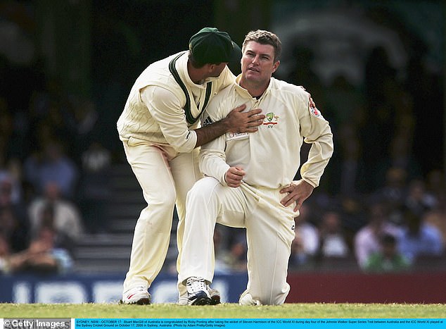 MacGill (right) played 44 Test matches for Australia between 1998 and 2008, taking 208 wickets