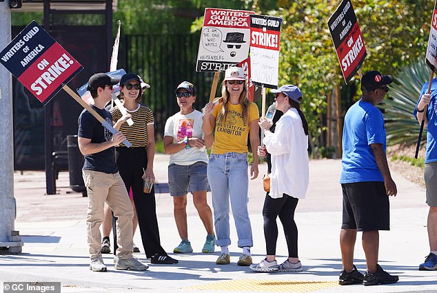 The Alliance of Motion Picture and Television Producers announced Thursday that it is working with the WGA to return to the negotiating table to end the strikes.