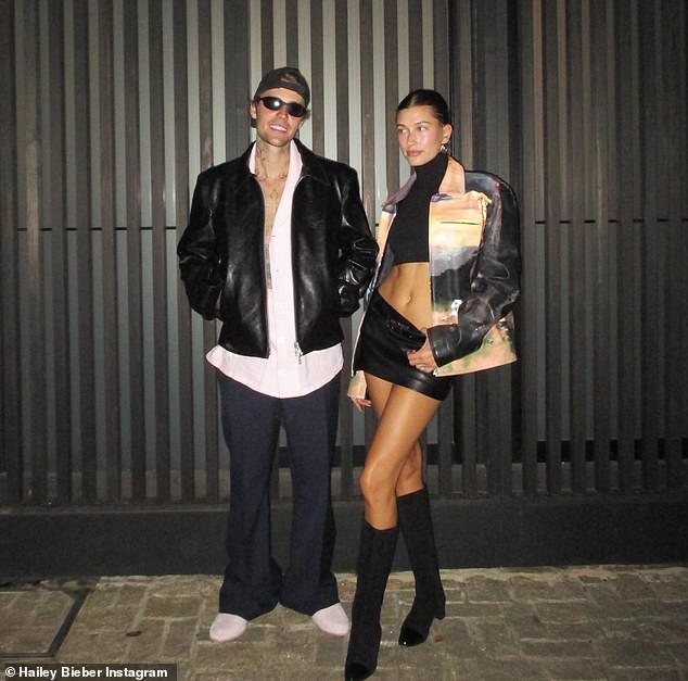 Model couple: Justin flashed a huge grin in an adorable photo of him posing with his supermodel wife