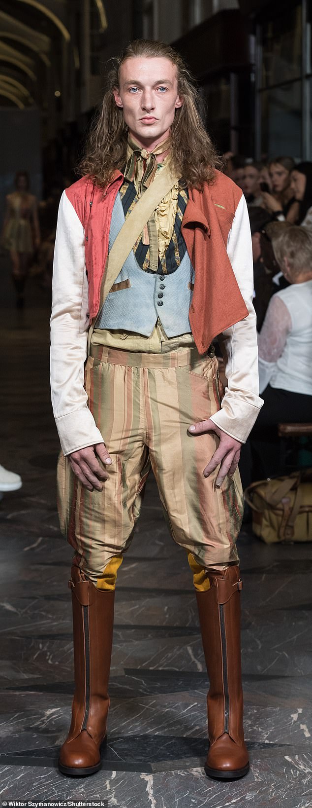 Here, a model has donned an outfit you'd expect from a history book: brown leather boots and tucked-in pants