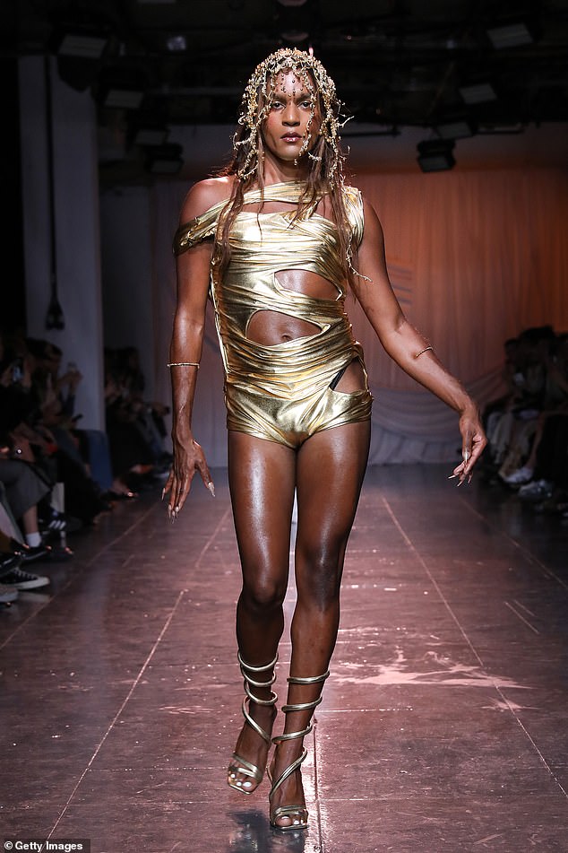 The model above donned a gold lycra outfit for the show, matched with matching stilettos, and most importantly, a beaded headpiece