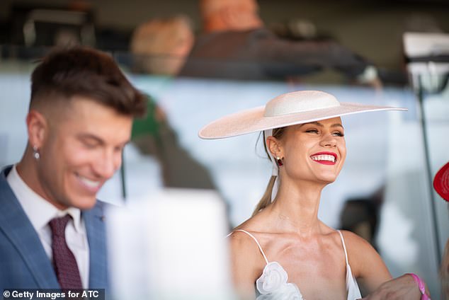 Her bold red lip was a stunning pop of color against her monochrome ensemble