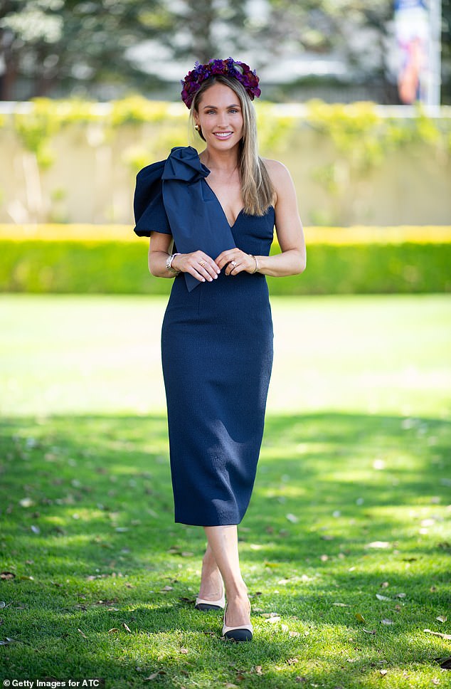 TikTok star Lucinda Pikkat (pictured) was the belle of the ball in a stunning $699 Rebecca Vallance dress