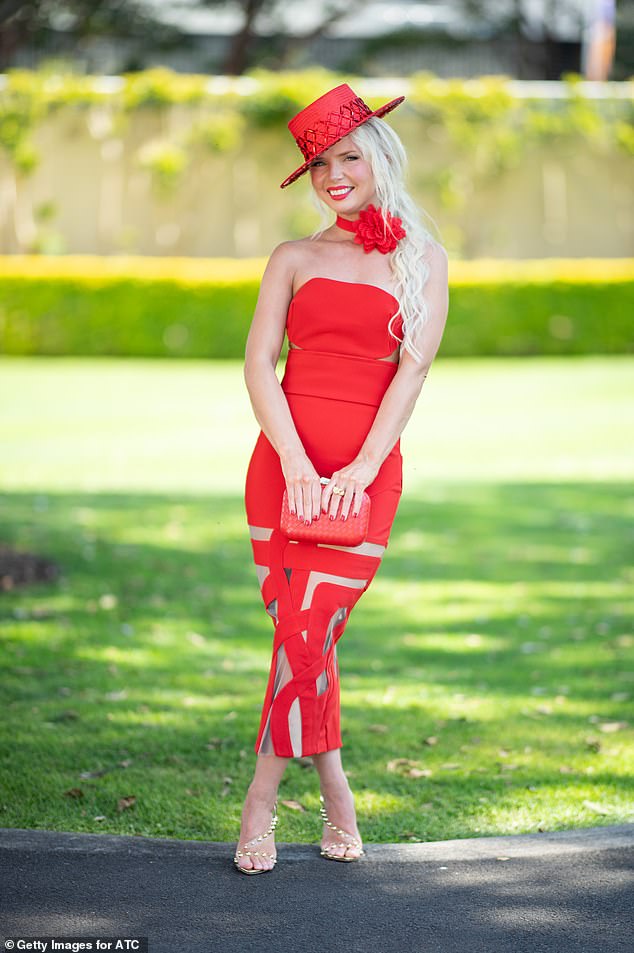 Elsewhere, hat designer Stacey Hemera Roberts (pictured) appeared to have stolen her style from Sophie Monk as she donned a scarlet strapless gown with cut-out details