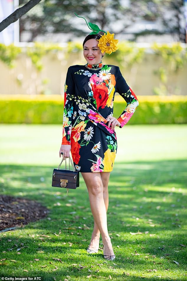 Finally, travel blogger Viera Macikova went for a bold color when she donned a $599 Camilla dress covered in floral details