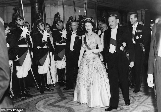 Queen Elizabeth II with Prince Philip at the Paris Opera during a visit in 1957