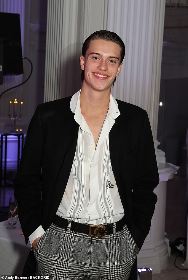 Designer: The teen completed the look with a Dolce & Gabbana belt and a black blazer