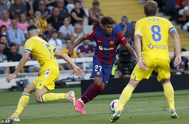 Yamal (centre) has played in all four of Barcelona's opening matches this season, becoming the youngest player to start a LaLiga match this century