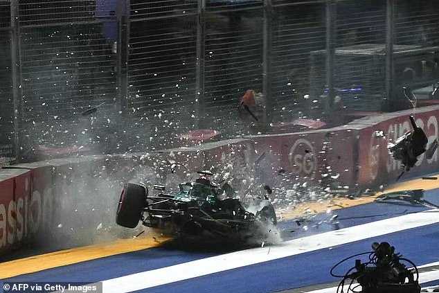 His car was briefly thrown off the ground while spinning and landed back on the track