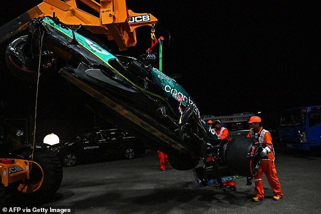 The impact ripped off the left front of his Aston Martin and brought out the red flag