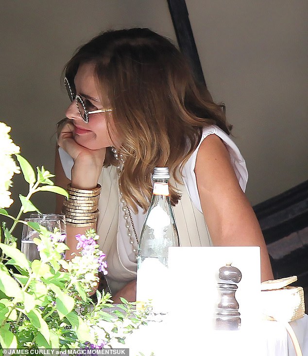 All smiles, the pair were deep in conversation as they enjoyed an al fresco lunch