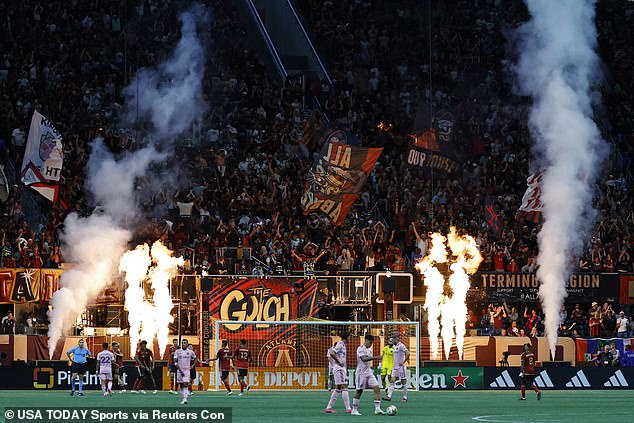 The Gulch, Atlanta's raucous home support behind the goal, celebrates their team's fifth-place finish