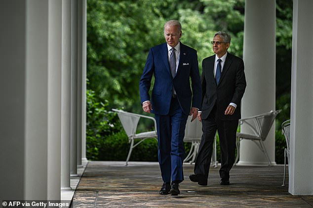 Biden and Garland will be seen at the White House in May 2022.  The two men are said to be extremely distant from each other