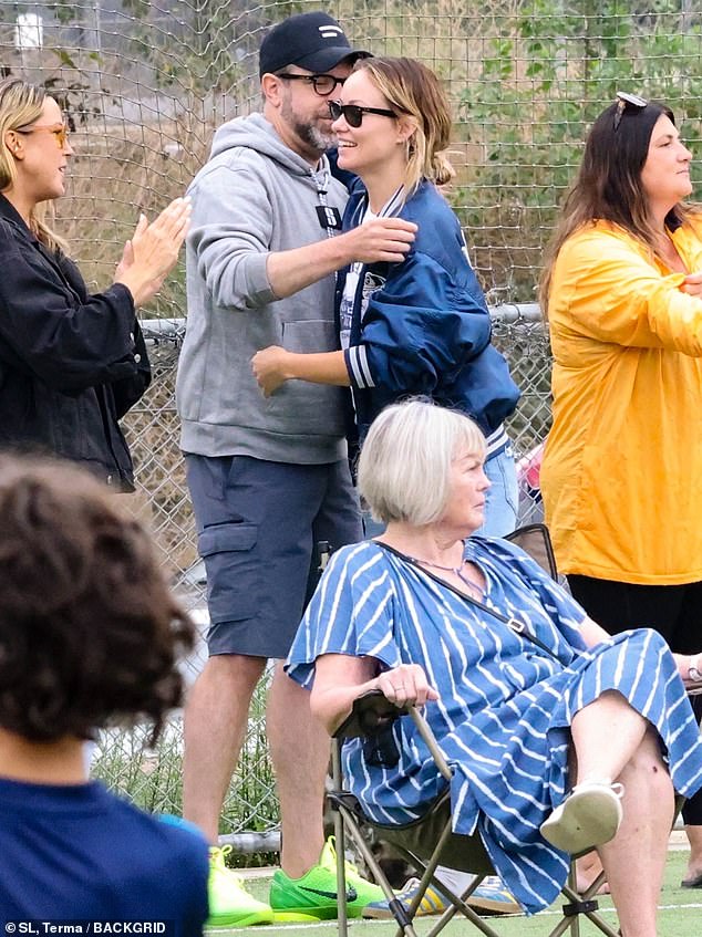 Amicable exes: The actress, 39, and the actor, 47, proved they are amicable exes as they hugged and high-fived during the game