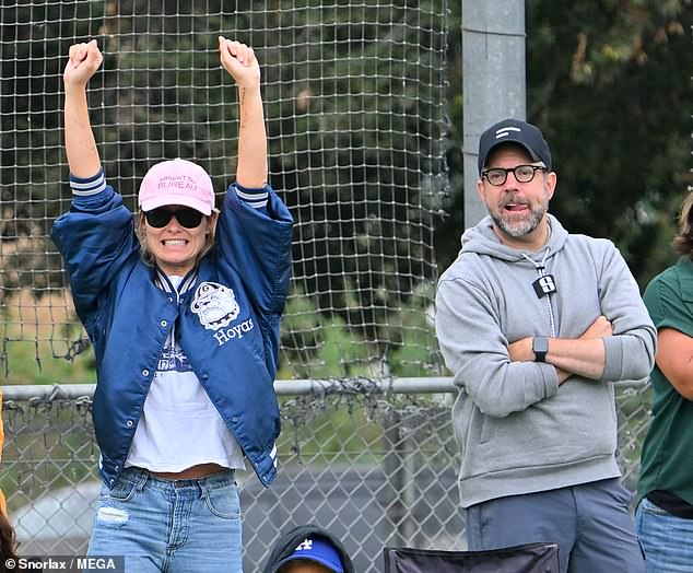 Celebration: The Don't Worry Darling star/director – who recently showed her support for the WGA – was also caught celebrating what appeared to be a goal for her child's team