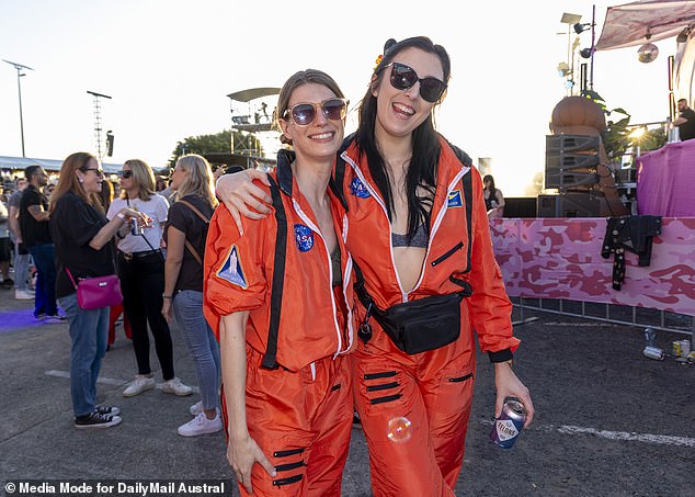 Or you can always wear matching orange outfits, which is also perfect for the 2023 festival season