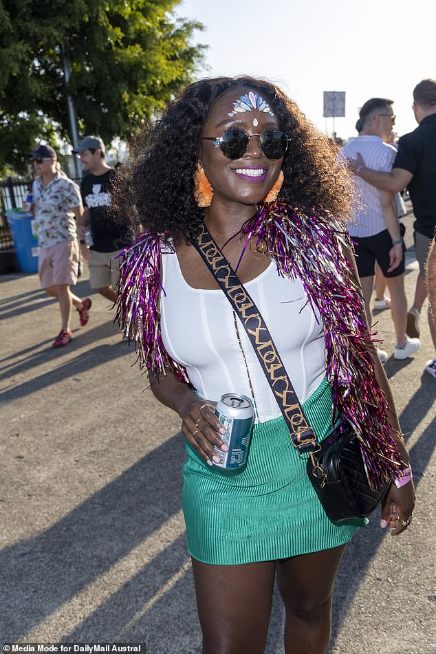 If you've ever wondered what to do with Christmas glitter tassels when it's not Christmas, wonder no more: They can be a fashion accessory (pictured)