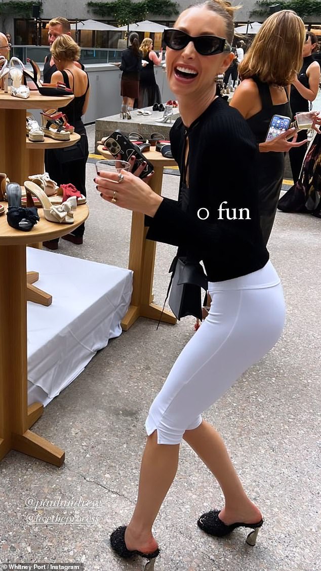 Girl on the go: Eager to put the ongoing weight loss drama aside, Whitney enjoyed a fun day out earlier this week in a pair of white capris, black heels and a black blouse