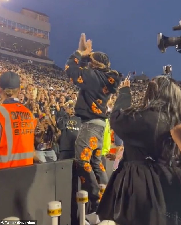 Offset pumped up the crowd as he stood next to Colorado fans and clapped his hands