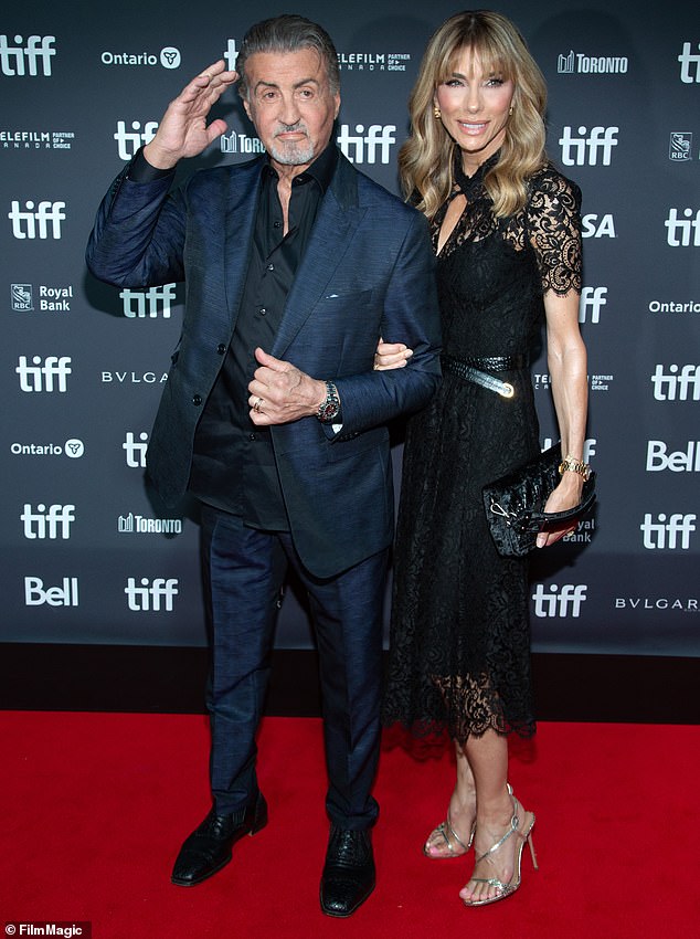 Power couple: The 77-year-old artist and his wife, 55, stayed close as they posed for several photos on the red carpet at the star-studded event