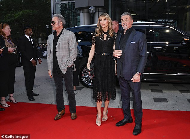 Suitable: Stallone's brother Frank wore a plaid jacket to the event, which was worn over a black button-up shirt