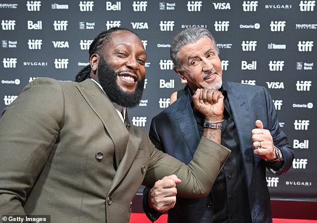 Television broadcaster Tyrone Edwards was pictured jokingly making fun of Stallone on the red carpet