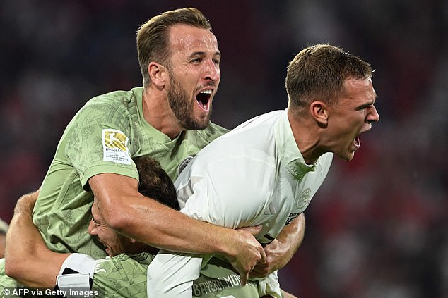 The striker celebrates with his teammates and quickly gets used to his new club