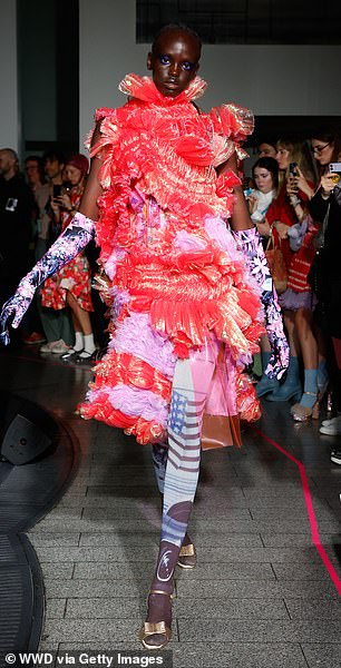 Bold look: Winnie and Ashleigh were joined on the catwalk by a number of other models