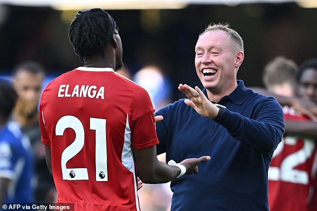 Cooper congratulates Anthony Elanga on his winning goal at Stamford Bridge this month