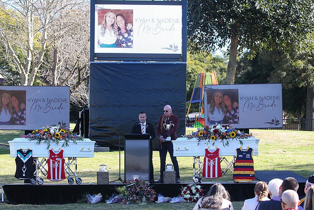 Graham McBride with Alex Tigani at the July funeral for both his 'girls', wife Nadene and daughter Kyah, who tragically died in the Hunter Valley bush crash in June